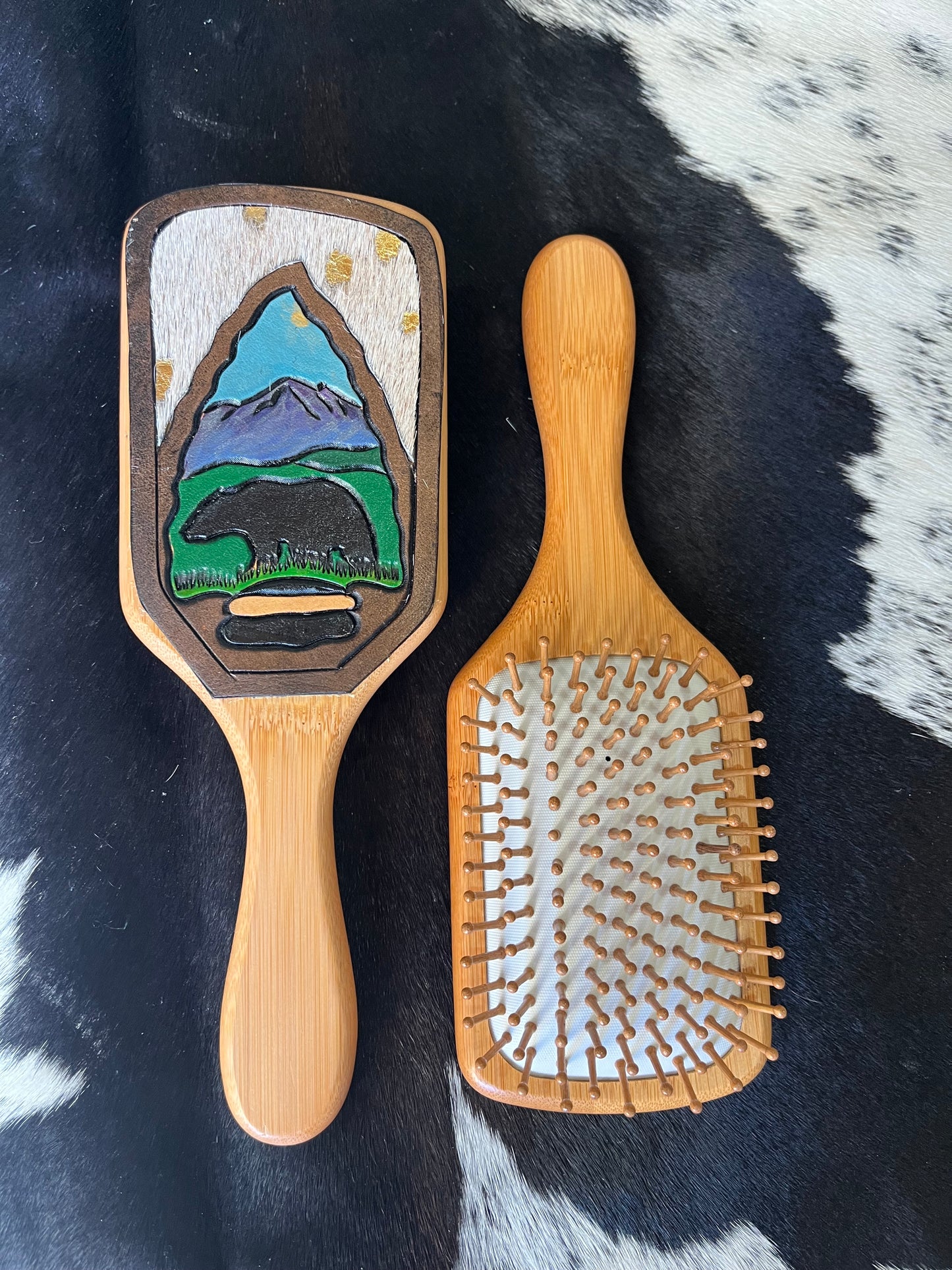 Hand tooled and cowhide hairbrush