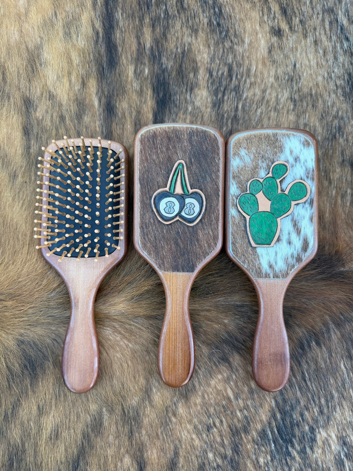 Hand tooled and cowhide hairbrush