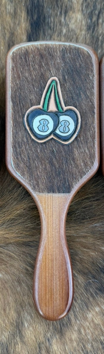 Hand tooled and cowhide hairbrush