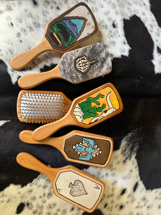 Hand tooled and cowhide hairbrush